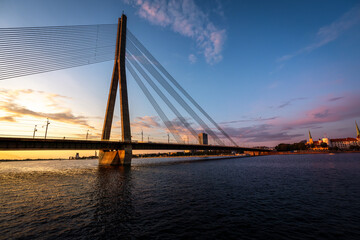 Fototapeta na wymiar Vansu Bridge and Daugava River at sunset - Riga, Latvia
