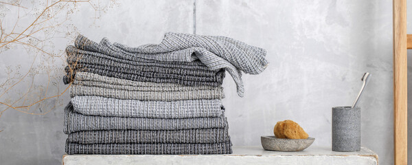 Organic waffle linen towels, bamboo toothbrushes, bathroom zero waste accessories in grey shades in...