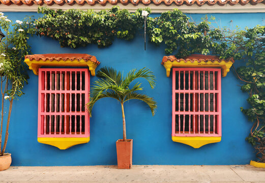 Street view of beautiful colonial houses in the historic downtown of Cartagena, Colombia.
