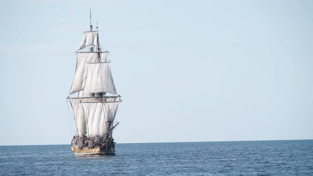 4K - Historical frigate. Sailing ship sails on the sea. Close-up