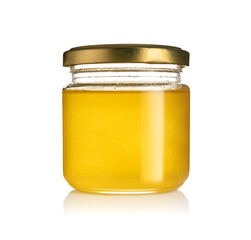 honey in a jar isolated on white background