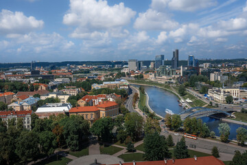 Fototapeta na wymiar Aerial view of Neris River with the modern buildings of the new city center (southern Snipiskes) - Vilnius, Lithuania