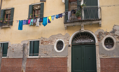 Laundry hanging from Venice balcony
