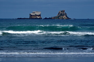 Rocky islets off the beach in Ayampe, Ecuador