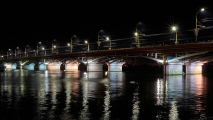 Fototapeta premium Chernavsky bridge over the Voronezh reservoir in the autumn night