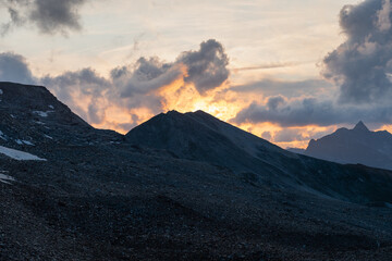 Vals, Switzerland, August 21, 2021 Burning sky after sunset at the mount Fanellhorn