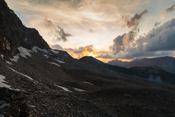 Vals, Switzerland, August 21, 2021 Burning sky after sunset at the mount Fanellhorn