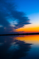 Fototapeta premium Autumn sunset on the lake, relaxation, lice inscription.
