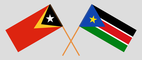 Crossed flags of East Timor and South Sudan. Official colors. Correct proportion