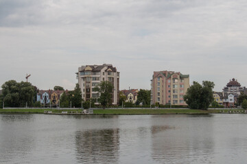 Fototapeta na wymiar Exterior of a residential building near upper lake, Kaliningrad, Russia.