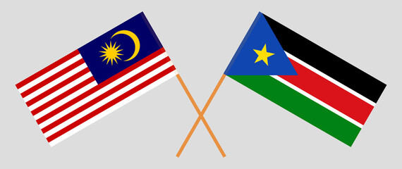 Crossed flags of Malaysia and South Sudan. Official colors. Correct proportion
