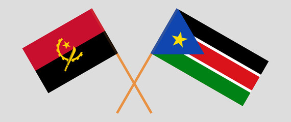 Crossed flags of Angola and South Sudan. Official colors. Correct proportion