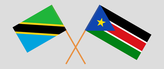 Crossed flags of Tanzania and South Sudan. Official colors. Correct proportion