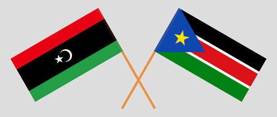 Crossed flags of Libya and South Sudan. Official colors. Correct proportion