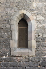 Fototapeta na wymiar Medieval window in the Gothic Quarter of Barcelona, Spain