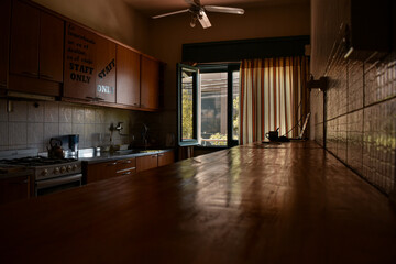interior of a kitchen illumineted by the sun ligth