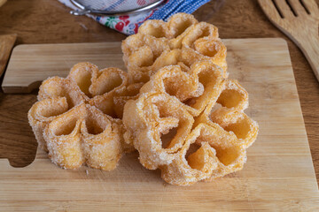 Sweet rosette flowers fried with sugar typical of Extremadura, Andalusia and Castilla, Spain. Christmas, Easter, Carnival