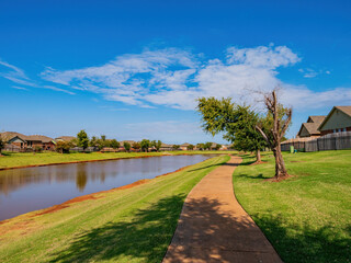 Sunny view of a beautiful community trail and envirnoment, trail