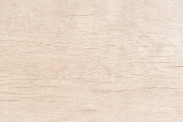 Light brown wood there are stains on the surface for background texture and copy space