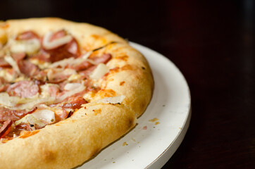 pizza on a wooden table