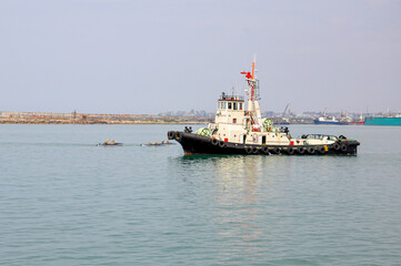 Fototapeta premium A tugboat in the port of Mar del Plata, Argentina