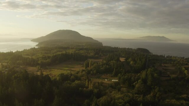 Sunrise Over Lummi Island, Washington. Lummi Island has become a destination for it's world class restaurant, nature preserves, and a vibrant artist community. But it still retains its rural character