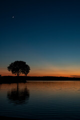 Peaceful and relaxing sunset by the lake.