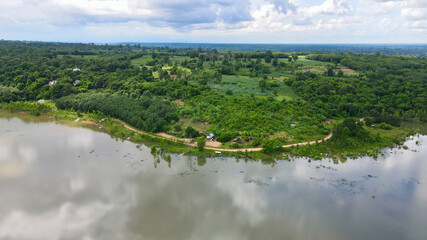 River and mountains with sky in the background.