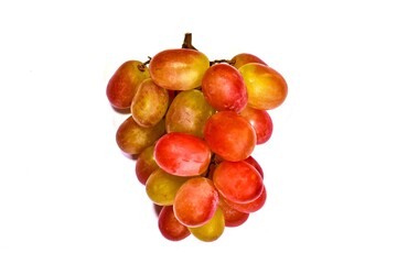 Beautiful bunch of ripe sweet red grapes isolated on white background