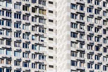 Close-up of a multi-apartment panel house with air conditioning