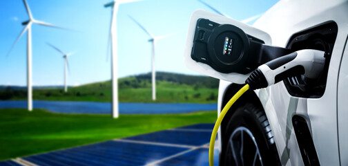 EV charging station for electric car in concept of green sustainable energy produced from renewable...