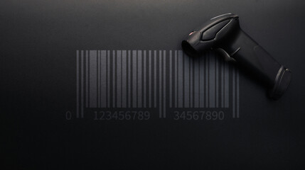 Barcode scanning. Reader laser scanner for warehouse. Retail label barcode scan on dark background....