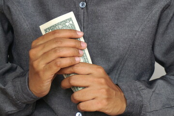 Dollars in the hand of a businessman