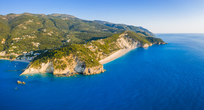 Aerial view of Milos beach near the Agios Nikitas village on Lefkada Ionian island, Greece. Evening sunset golden light
