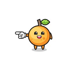 orange fruit cartoon with pointing left gesture
