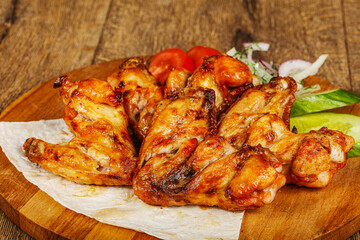 Chicken wings barbeque vith vegetables