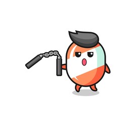 Obraz premium cartoon of candy using nunchaku