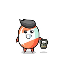 Fototapeta premium candy mascot lifting kettlebell in the gym