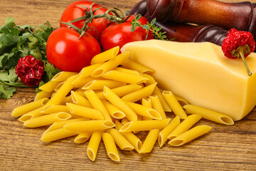 Raw penne rigate for cooking