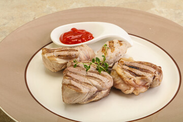 Grilled pork tenderlion with tomato sauce