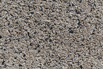 Crushed granite stones wall - close up