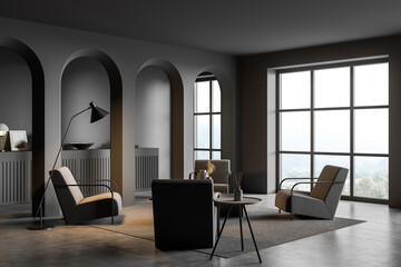 Dark living room interior with armchairs and decoration, panoramic window