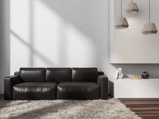 Modern white living room with dark leather couch