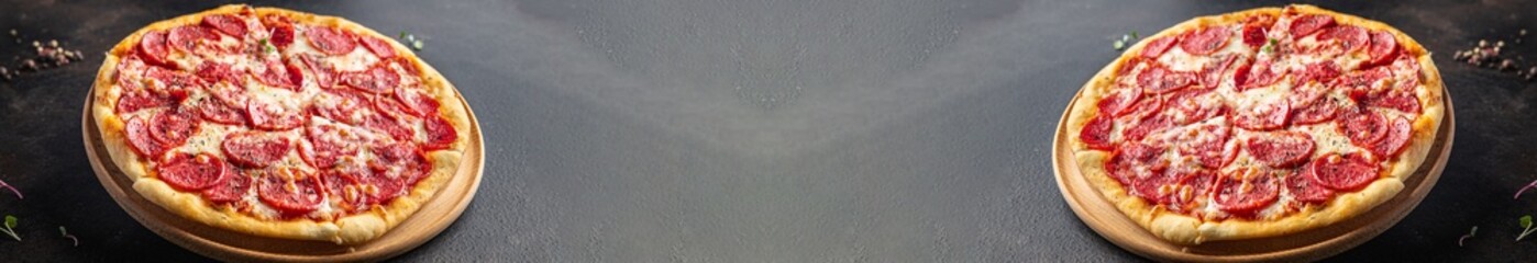 Pizza salami sausage pizza  pepperoni fast food cheese, tomato sauce, dough Takeaway fresh meal snack on the table copy space food background  pattern rustic 