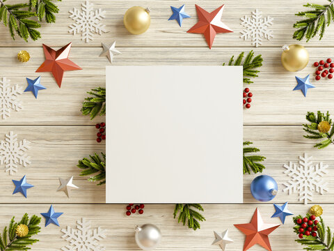 Mockup paper blank on christmas tree branches which has a wooden back.