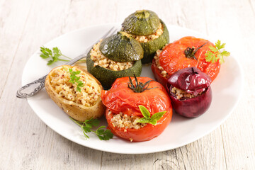 baked stuffed vegetable ( potato,  tomato and zucchini)