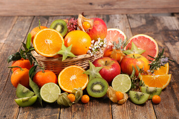 various of fresh fruits (orange,  kiwi,  apple and grapefruit)