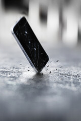 Smartphones falling and crashing on the ground