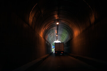A very narrow tunnel under the road