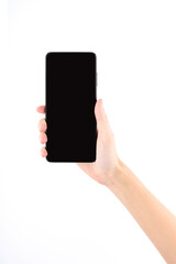 Woman hand holding black smartphone with blank screen isolated on white background.